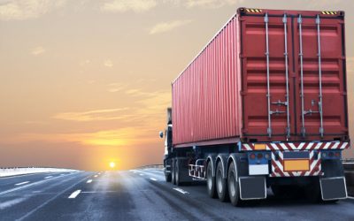 truck-on-highway-road-with-red-container_42493-12